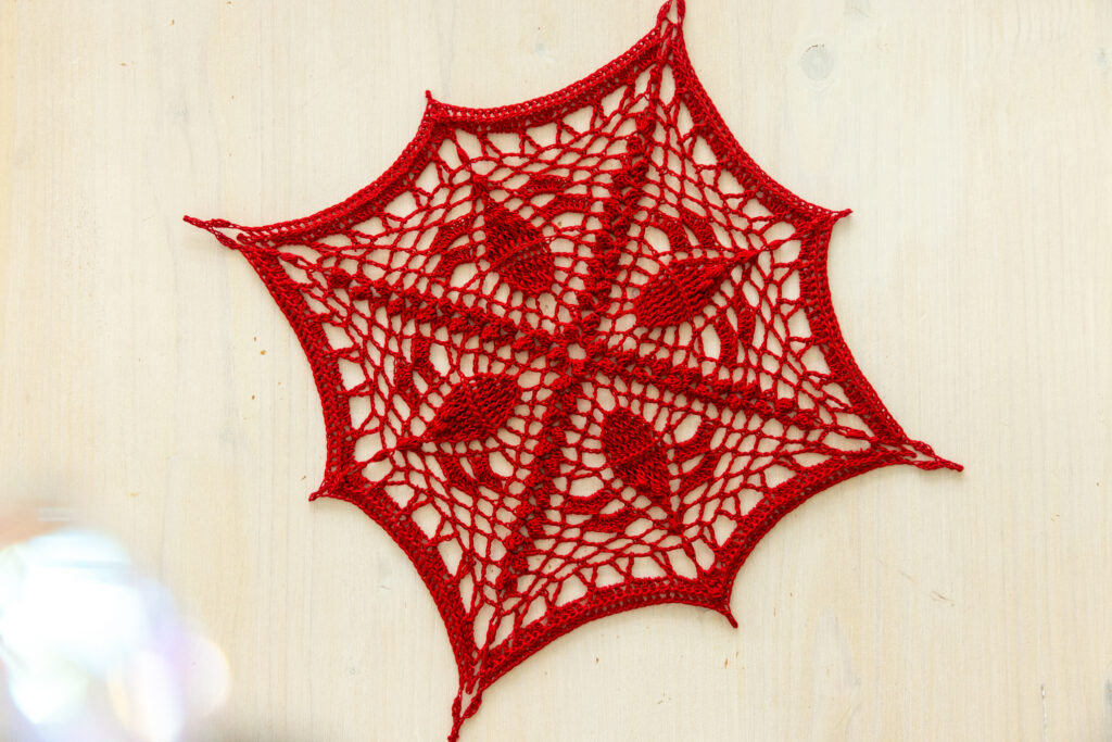 Red crochet doily, 21 cm