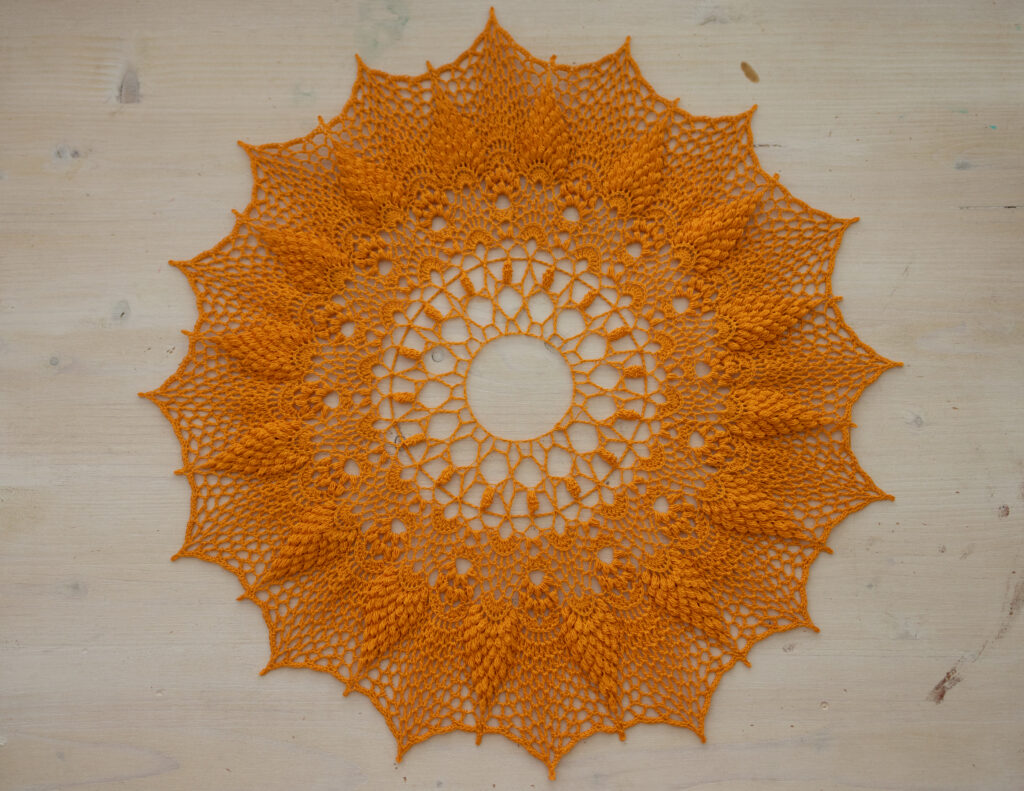 Orange crochet doily, 40 cm