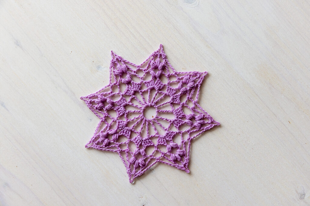 Beautiful purple crochet doily, 12 cm