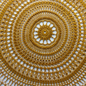 Golden crochet doily Ignatia, 56 cm