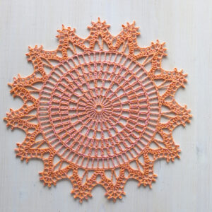 Orange and pink crochet doily, 36 cm
