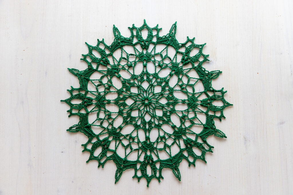 Fabulous crochet doily in green color, beautiful Susanne, 31 cm