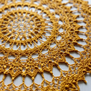 Beautiful gold crochet doily Radmila, 35 cm