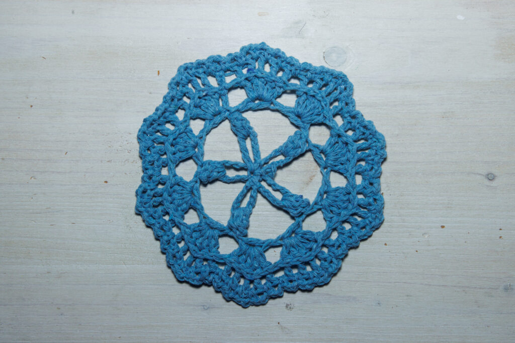 Blue crochet doily, 13 cm