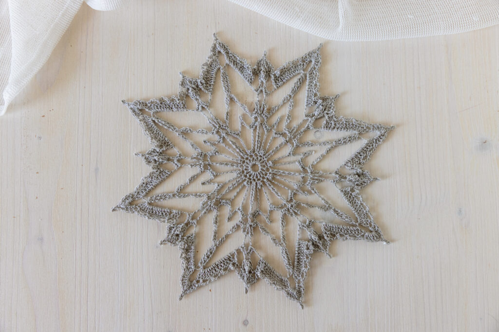 Amazing crochet snowflake Romana in silver color, 22 cm