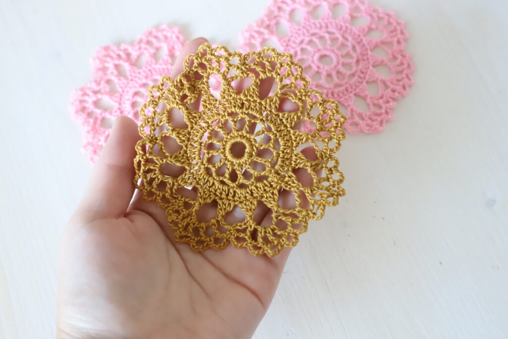 Gold crochet coaster, 10 cm
