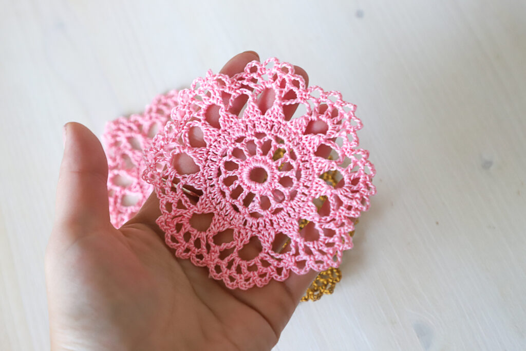 Pink crochet coaster, 10 cm