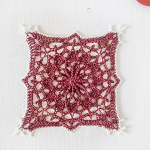 Bordó red crochet doily, 7.5 in