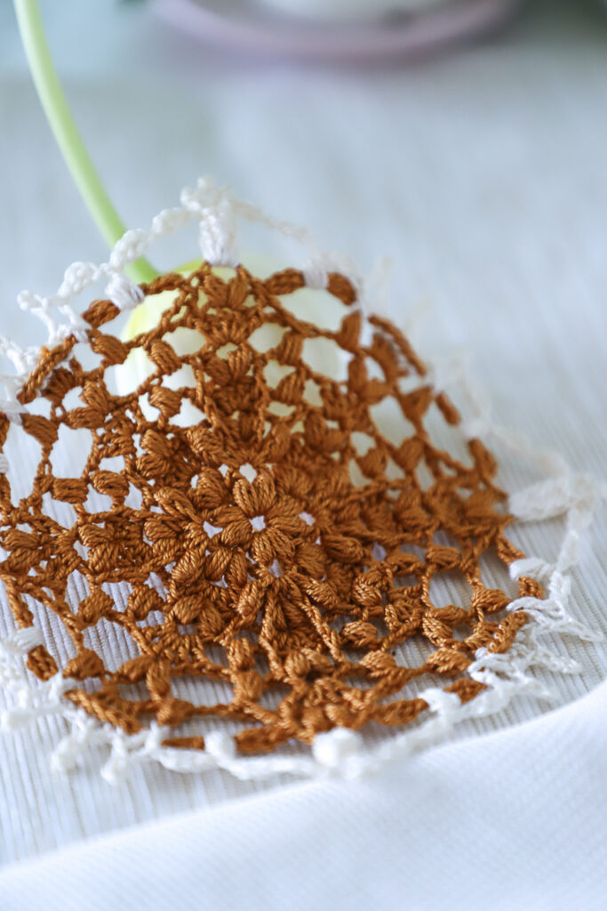 Ivory and gold crochet doily Alida, by Olga Shalaeva , 14 cm