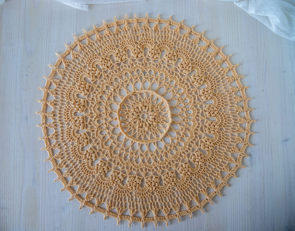 Beige crochet doily, 39 cm
