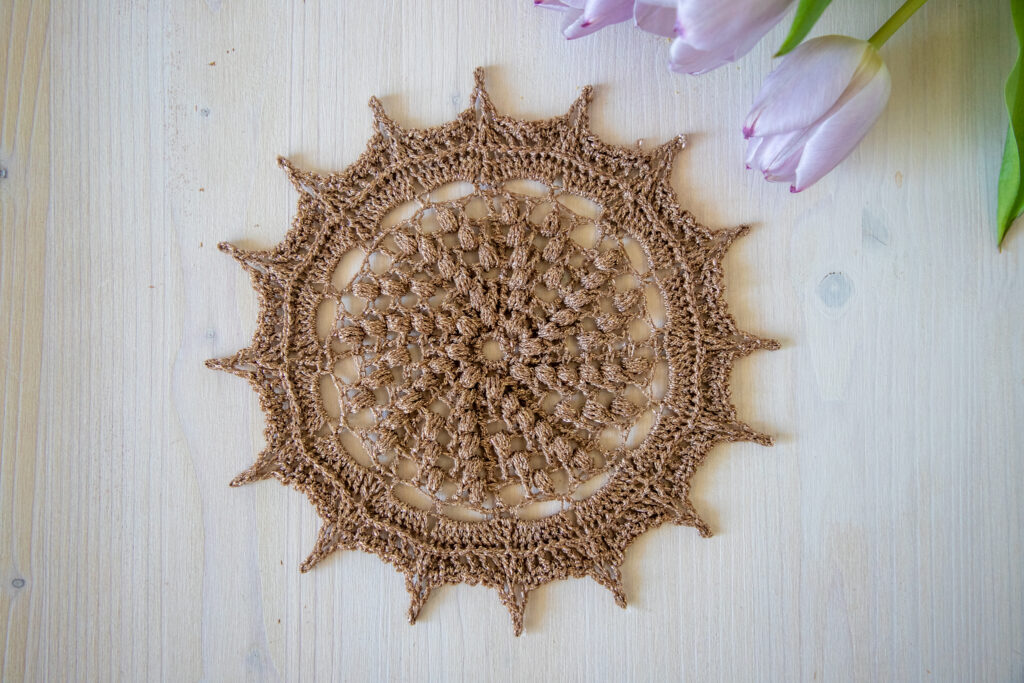 Brown and gold crochet doily, 20 cm