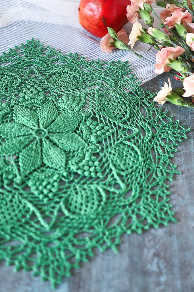 Green textured crochet doily, 33 cm